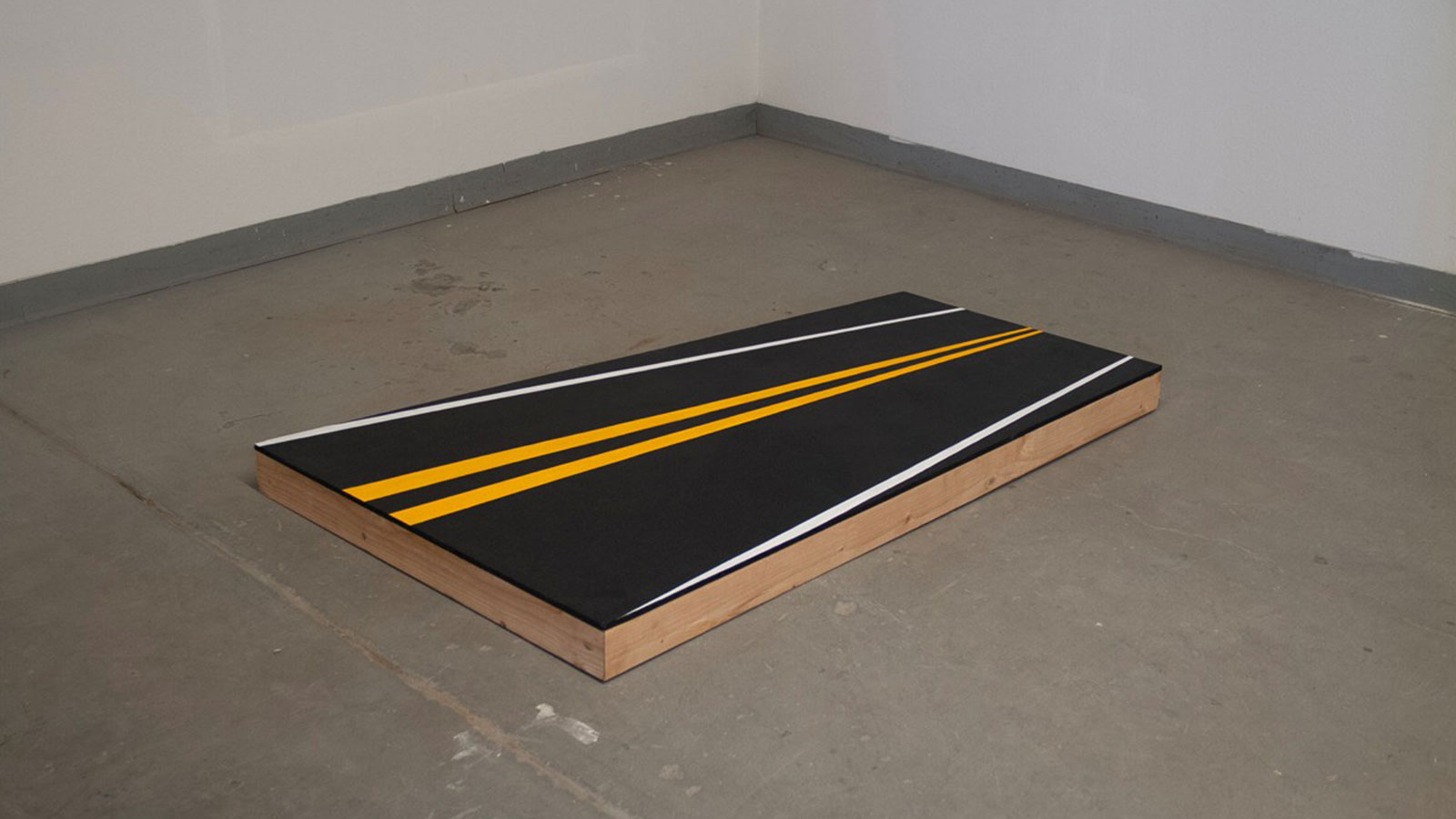 A road painted on a board