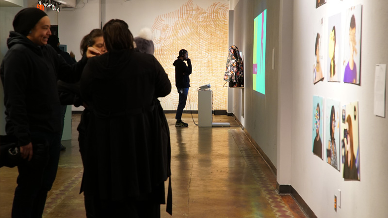 patrons chat during an exhibition
