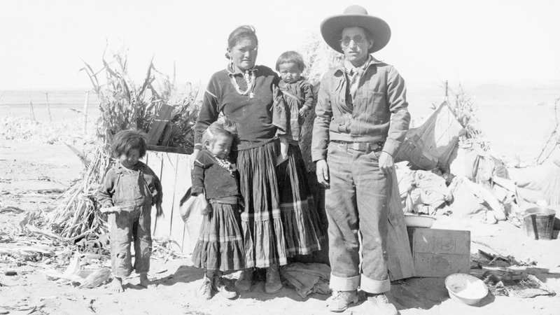 an old photo of a native family